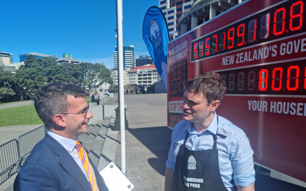 ACT leader David Seymour with Taxpayers' Union executive director Jordan Williams outside Parliament on 12 September 2023.