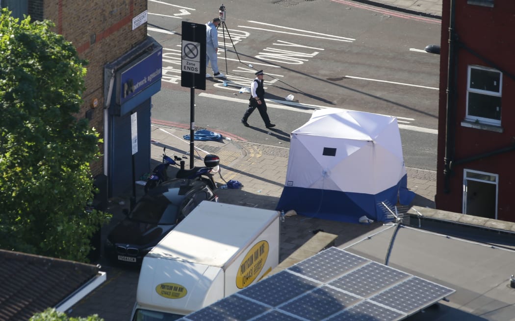 A forensic tent at the scene of the van attack on worshippers at a mosque in  Finsbury Park, north London.
