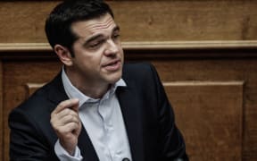 Greece's Prime Minister Alexis Tsipras speaks during an emergency Parliament session on 27 June.