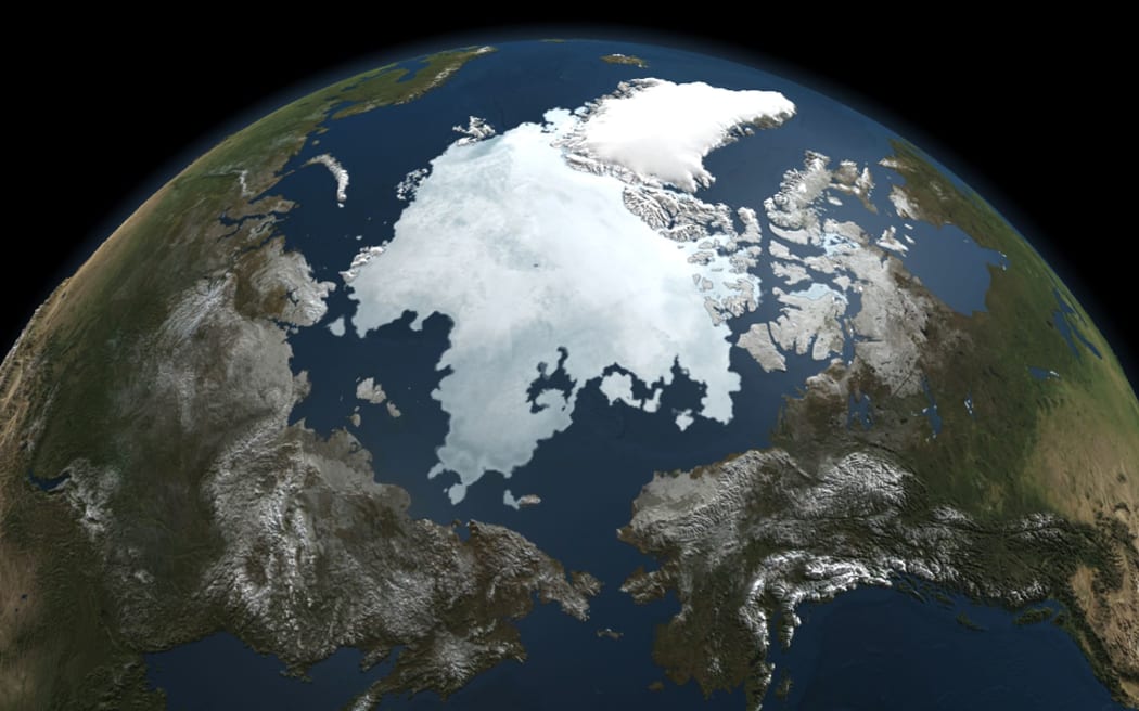 A picture by NASA's Aqua satellite taken on September 3, 2010 shows the Arctic sea ice. The Arctic Ocean's dynamic layer of sea ice that grows each winter and shrinks each summer, reaching its yearly minimum size each fall. The ice cools the planet by reflecting sunlight back into space.