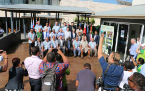 The media pack making the most of the photo op of Pacific Islands leaders posing with some of the great minds behind RAMSI including, senior Police executives, former RAMSI special coordinators and politicians as well as regional experts.