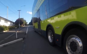 Bus close to cyclist