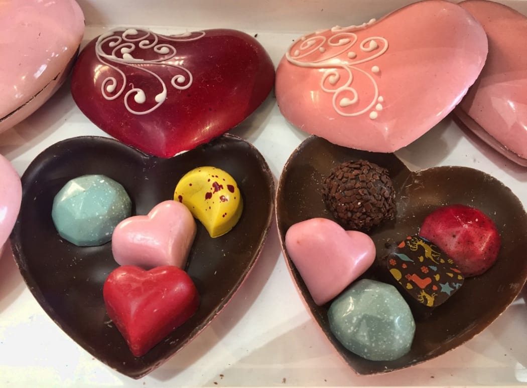 Decorative Belgian chocolate truffles in heart-shaped boxes made of chocolate at a sweet shop in the historic town of Unionville, Ontario, Canada.