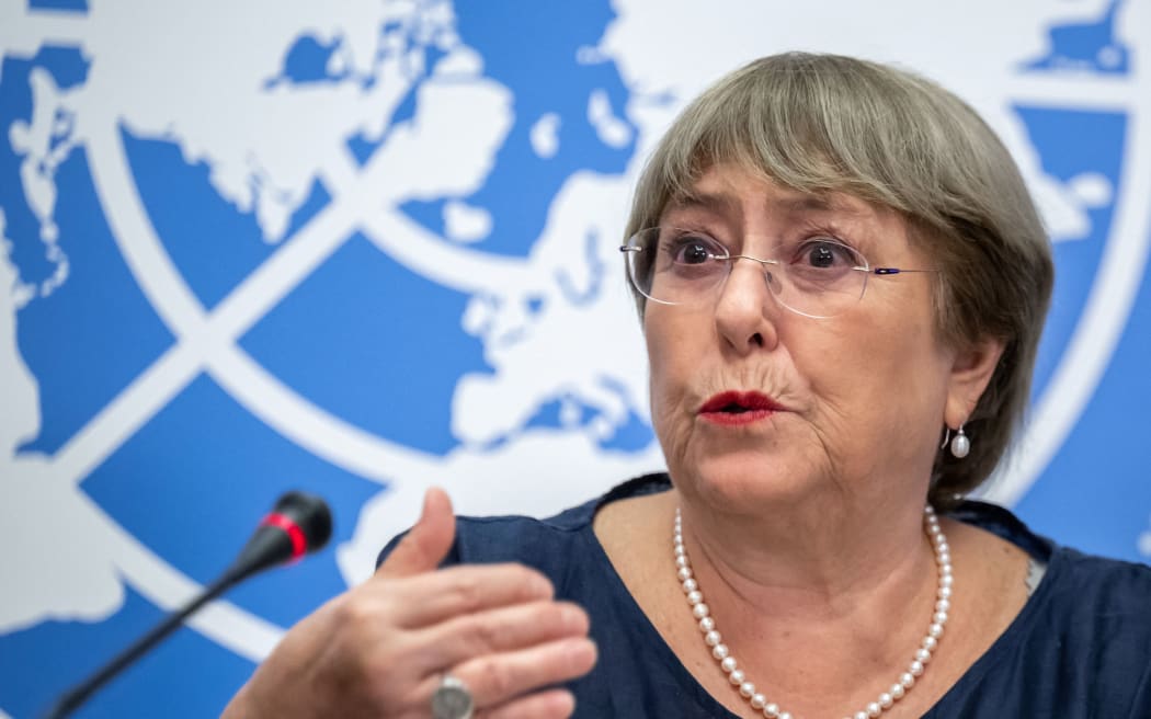 Outgoing United Nations High Commissioner for Human Rights Michelle Bachelet gives a final press conference at the United Nations offices in Geneva on August 25, 2022. - Bachelet faces pressure to release a long-delayed report on the situation in the Xinjiang region, where Beijing stands accused of detaining more than one million Uyghurs and other Muslim minorities -- charges it vehemently denies. She has vowed the report will be released before she steps down, at the end of the month. (Photo by Fabrice COFFRINI / AFP)