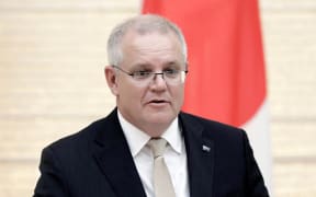 Australia's Prime Minister Scott Morrison speaks during a joint news conference in Japan on November 17, 2020.
