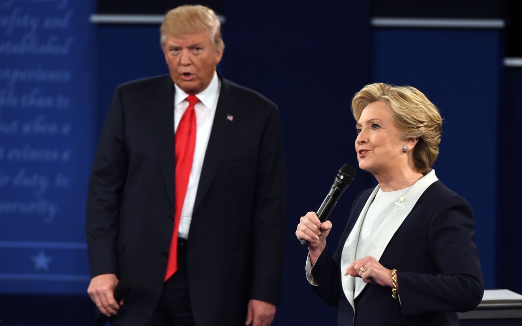 Donald Trump stands behind Hillary Clinton at the second presidential debate.