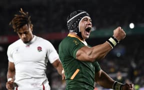 South Africa's wing Cheslin Kolbe celebrates after scoring his try.
