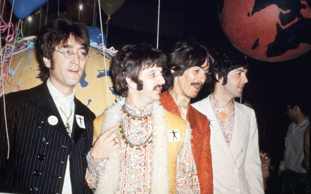 (L-R) English singer, songwriter and guitarist John Lennon  (1940-1980), English singer and drummer Ringo Starr, English singer, songwriter and guitarist George Harrison (1943-2001), and English singer, songwriter and bassist Paul McCartney, all of The Beatles, during their world premiere of "All You Need Is Love" on the television show "Our World," recorded in EMI's Studio One, June 25, 1967, in London, England.