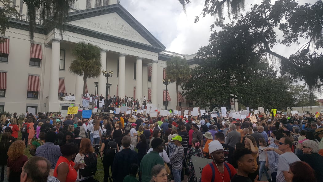 Students from Marjory Stoneman Douglas High School and supporters rally at Florida's Capitol in Tallahassee on Wednesday.