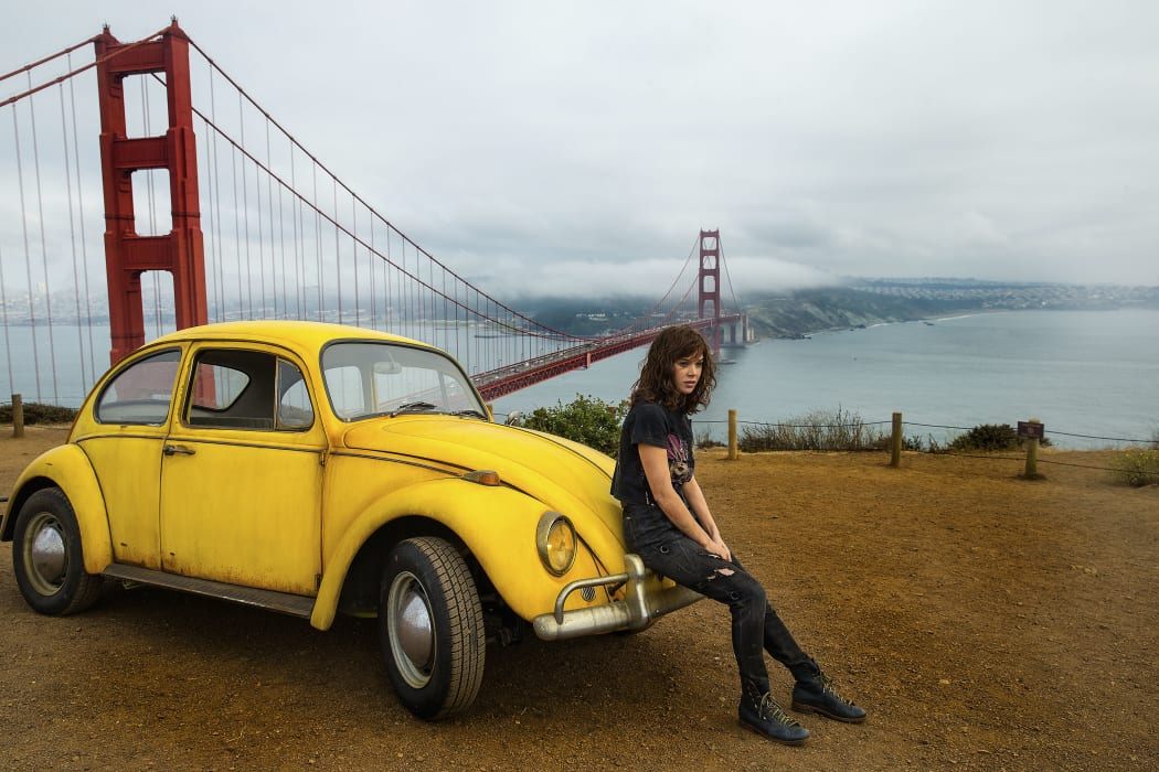 Bumblebee and Hailee Steinfeld as Charlie in Bumblebee, from Paramount Pictures.