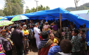Polio has been confirmed in Enga province, prompting a large containment, monitoring and vaccination campaign. Here, a crowd gathers for vaccines.