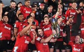 Crusaders players celebrate winning the Super Rugby Title in 2018. Crusaders v Lions, Super Rugby Final. AMI Stadium, Christchurch, New Zealand. Saturday 4 August 2018 © Copyright photo : Andrew Cornaga / www.photosport.nz