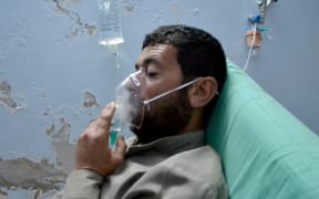 A Syrian man receives treatment at a field hospital following a suspected chlorine gas attack by Assad regime forces in Idlib, Syria on May 03, 2015.