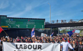 Marchers took over part of the Auckland motorway during a protest on Saturday. The march was organised by the Freedom and Rights Coalition, and protests were direct at a number of causes and authorities, including anti-vaccines, anti-lockdowns, and anti-politician, with the slogan: "They all must go".