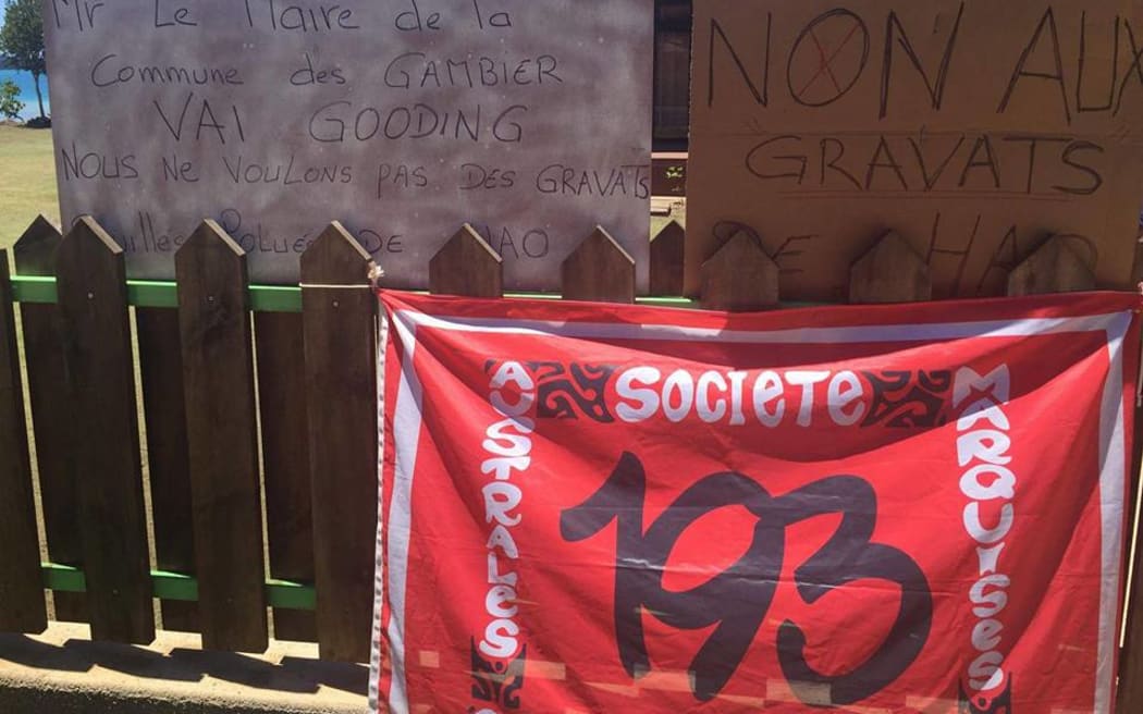 A protest group's banner on Mangareva Atoll