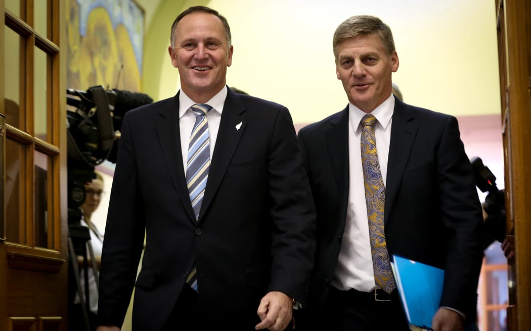 John Key (left) and Bill English on their way to announce the 2015 Budget.