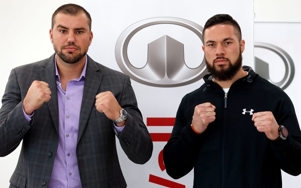 Razvan Cojanu (L) and Joseph Parker face off during a press conference ahead of the WBO world heavyweight championship boxing title fight scheduled for May 6.