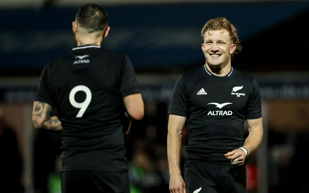 New Zealand's TJ Perenara with Damian McKenzie in 2022.