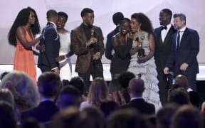 The cast of "Black Panther" accepts the award for outstanding performance by a cast  at the 25th annual Screen Actors Guild Awards on Sunday, Jan. 27, 2019, in Los Angeles.