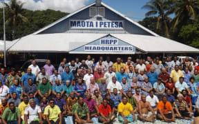 The elected members of Samoa's Human Rights Protection Party with supporters outside the party's headquarters on Saturday.