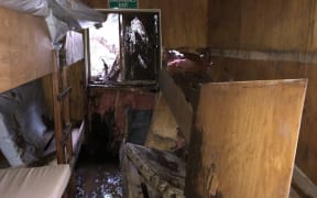 A DOC hut in Fiordland was almost wiped out by a slip caused by heavy rain in the area.