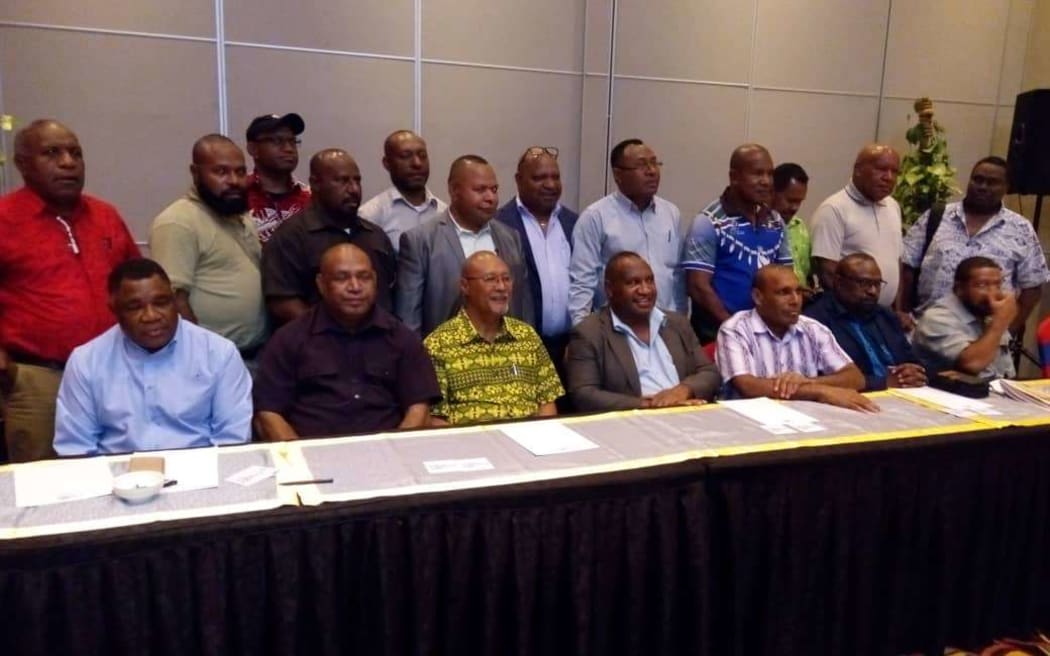 The MPs who have defected from the government of Prime Minister Peter O'Neill include several senior ministers. They held in a news conference in Port Moresby on Friday.