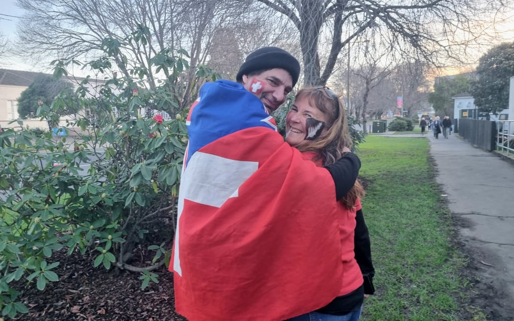 Louise and Mathias said they would be happy with any result in Ōtepoti. They were given a special Swiss-New Zealand combined flag at their wedding to mark their different homelands. Mathias says it's the first time they've been able to bring it out.