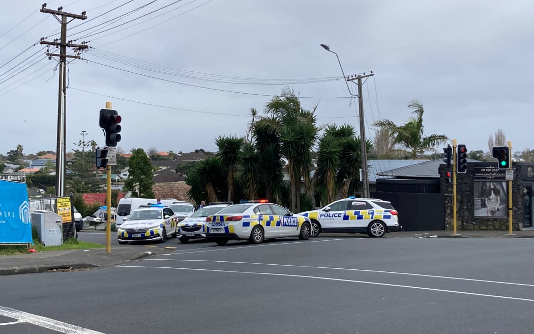Police on the corner of Bardia Street and Lake Road in Belmont, Auckland.