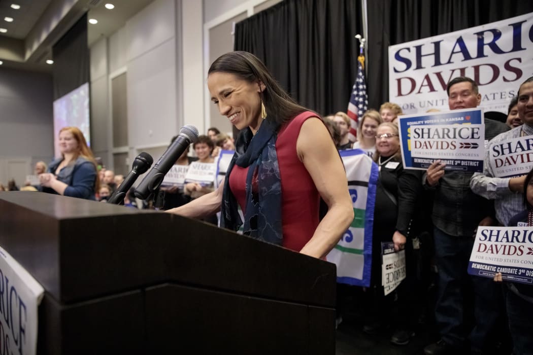 Democratic candidate for Kansas' 3rd Congressional District Sharice Davids speaks to supporters during an election night party.