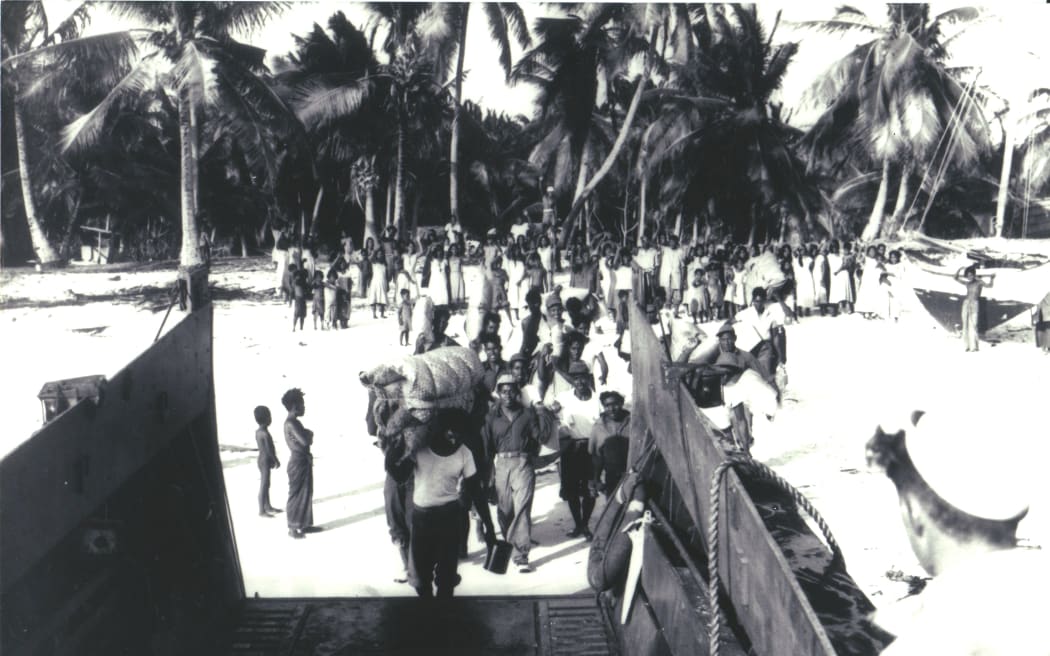 Bikinians in the Marshall Islands being evacuated from their home island after nuclear testing in the area by the US.