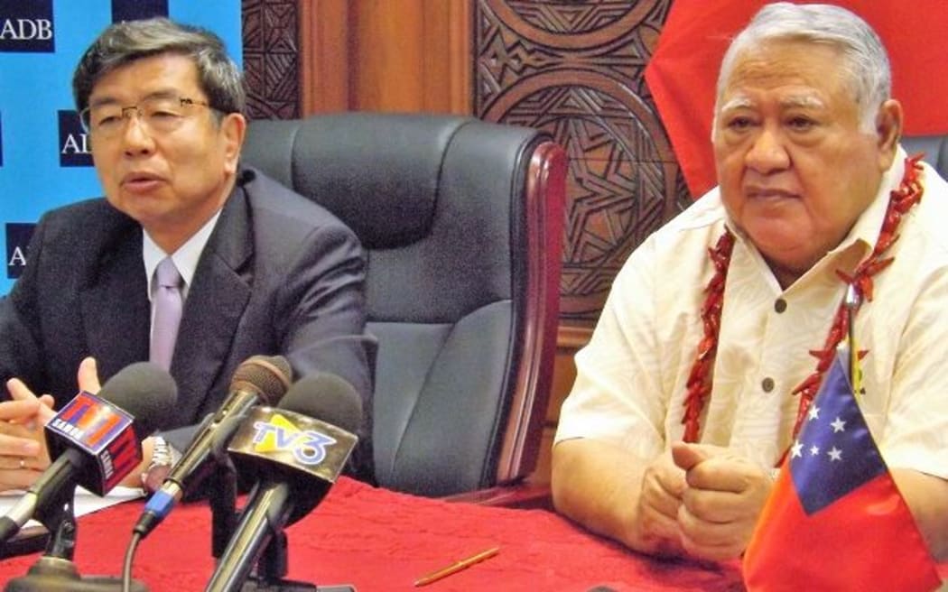 ADB President Takehiko Nakao, (left), and Samoa PM Tuila'epa