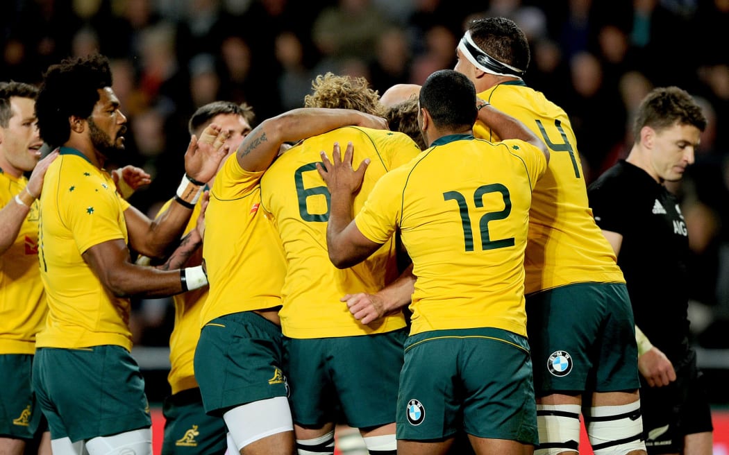 The Wallabies celebrate after the try of Michael Hooper in the second Bledisloe Cup game in Dunedin.
