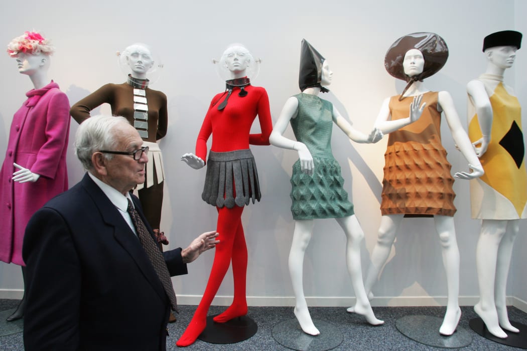 Pierre Cardin poses his space fashion designs in 2006 in Saint-Ouen, France.