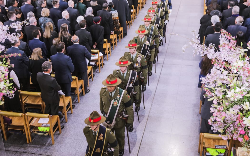 Defence Force staff arrive at the cathedral for the state memorial service.