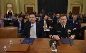 FBI director James Comey, left,  and National Security Agency director Mike Rogers at the Intelligence Committee hearing.