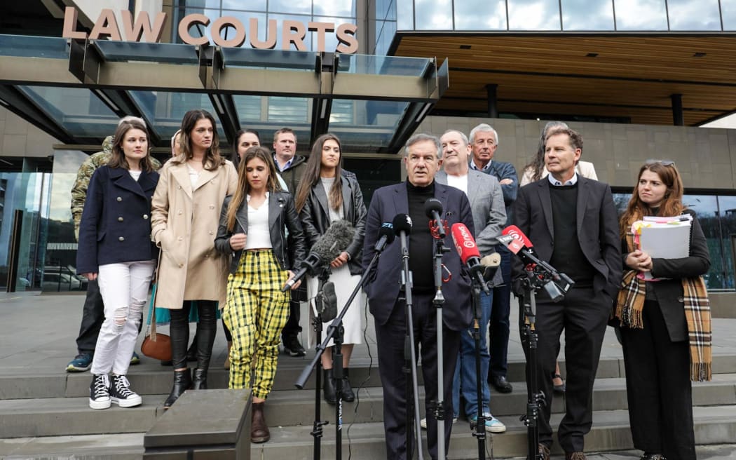 Plaintiffs, witnesses and supporters, including barrister Brian Henry and Gloriavale Leavers Support Trust manager Liz Gregory, hold a press conference outside the Christchurch courts following the decision about women being found workers - not volunteers-  being released.