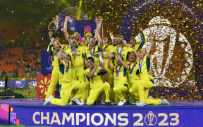 Victorious Australian Team with the winner's trophy during the ICC Cricket World Cup 2023 Finals match between India and Australia