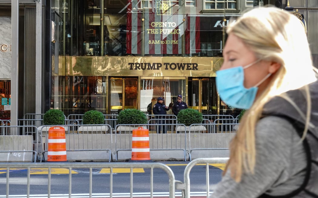 A person wearing mask walks past the Trump Tower. New York City continues Phase 4 of re-opening following restrictions imposed to slow the spread of coronavirus on October 17, 2020 in New York City.