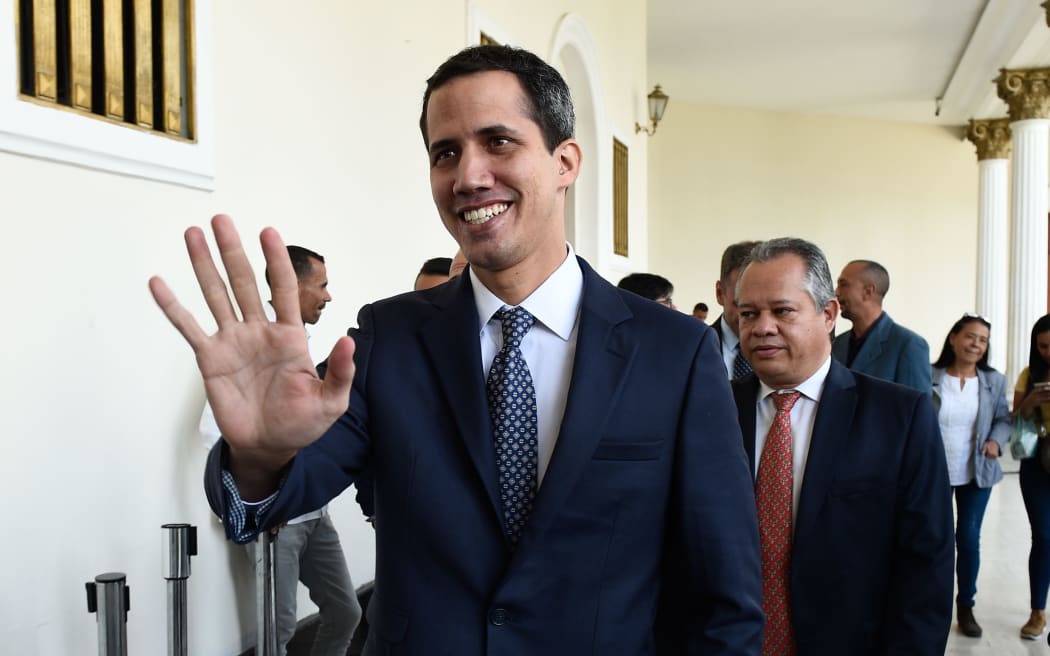 The president of Venezuela's opposition-led National Assembly, Juan Guaido, arrives for a session at the Federal Legislative Palace in Caracas.