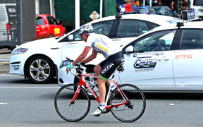 Cyclist in Wellington traffic.