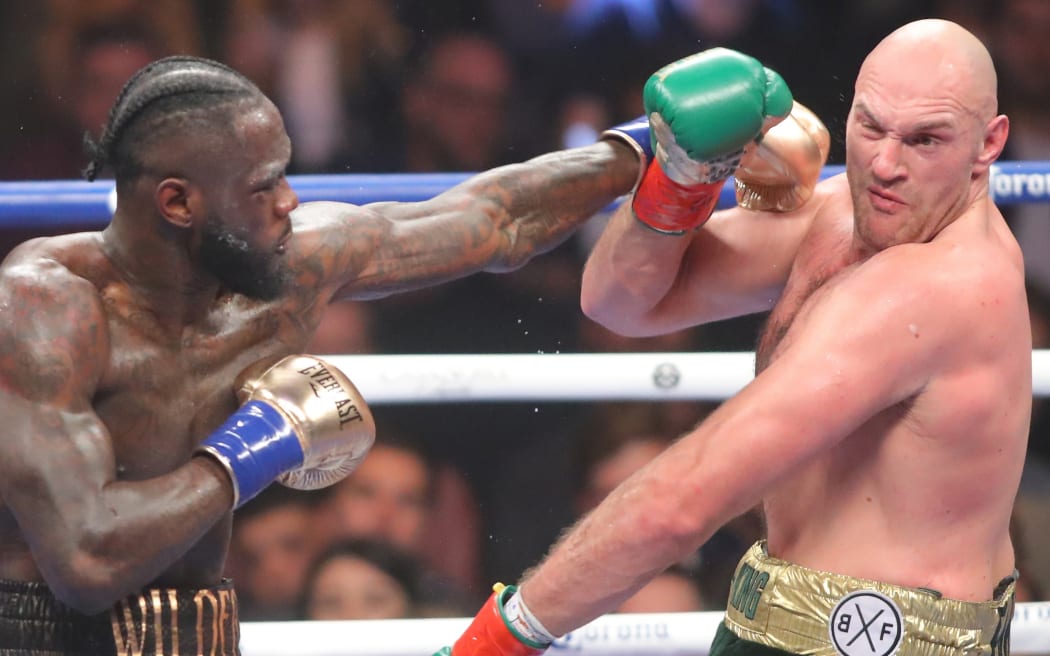 Deontay Wilder fighting Tyson Fury in the WBC World Heavyweight Title in Los Angeles.