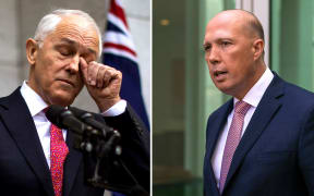 Australia's Prime Minister Malcolm Turnbull (L) and leadership challenger Peter Dutton