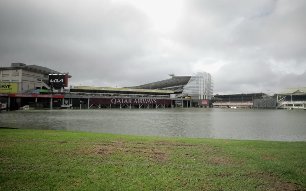 Water is pumped out of Auckland's Eden Park after severe rainfall flooded the grounds.