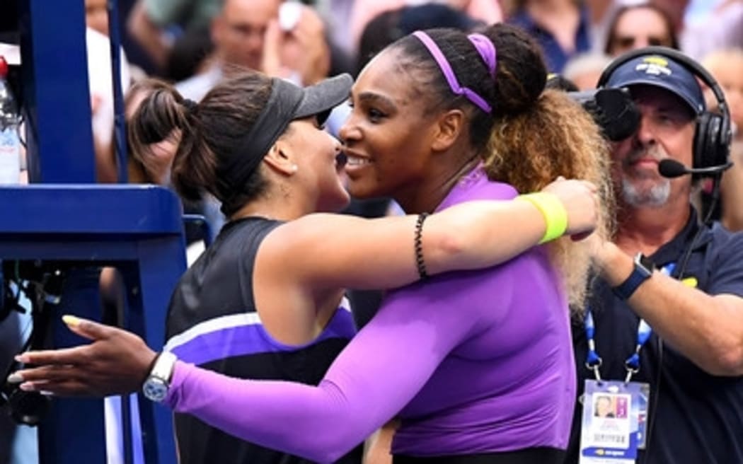 Serena Williams and Bianca Andreesu embrace after Andreescu's victory.