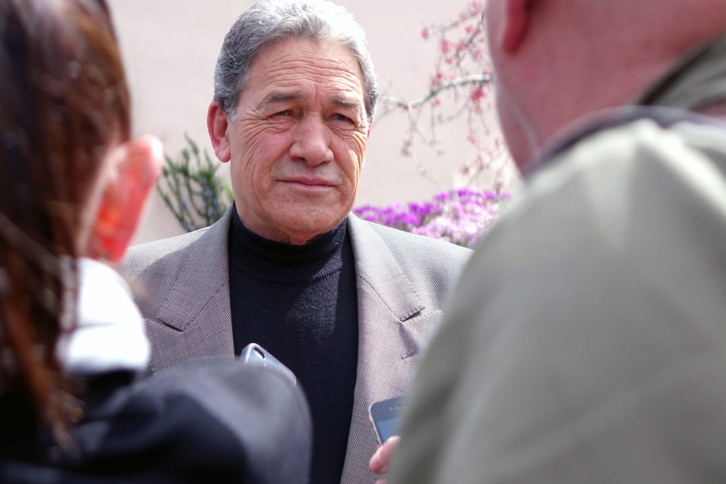 Winston Peters speaks to media after voting in Auckland.
