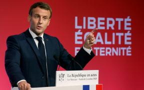 French President Emmanuel Macron delivering a speech on his strategy to fight separatism, near Paris.