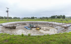 The effluent pond at Simon Mackle's dairy farm is being used to dump milk that is unable to be shipped out of the dairy farm.