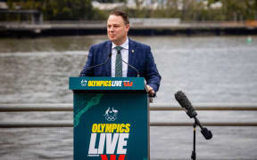 This photo taken on July 15, 2021 shows Brisbane Lord Mayor Adrian Schrinner speaking during an Olympics live announcement in Brisbane. T