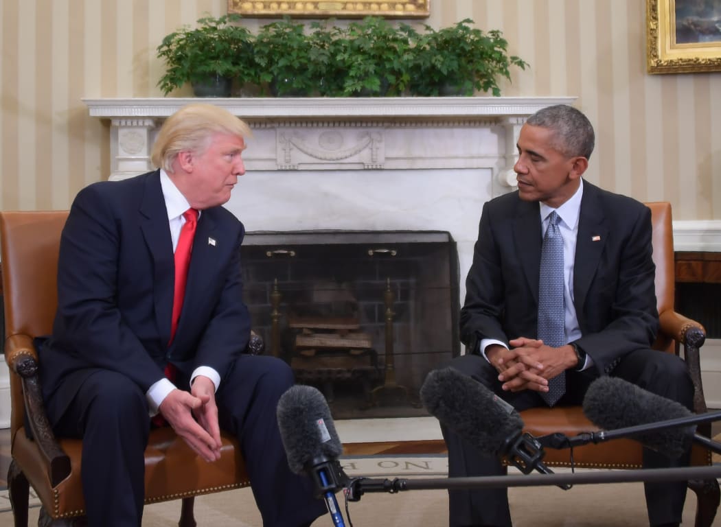 US President Barack Obama meets with President-elect Donald Trump on transition planning in the Oval Office at the White House on November 10, 2016 in Washington,DC. (Photo by JIM WATSON / AFP)