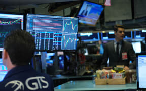 Traders work on the floor of the New York Stock Exchange (NYSE) on January 08, 2020 in New York City. As tensions with Iran continue to concern global markets, the Dow Jones industrial average opened 7 points up on Wednesday, after futures tumbled more than 400 points late Tuesday.